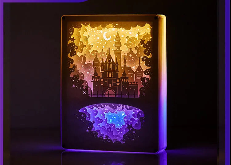 Modern USB bedside night light with intricate paper carving design and remote control.