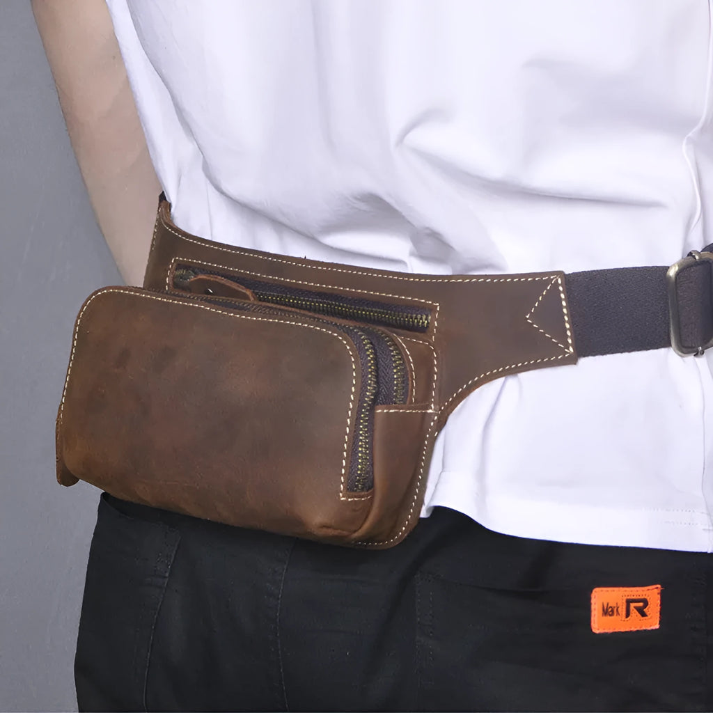 Brown cowhide leather men's sports waist bag with pull closure showing dimensions
