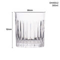 Thick bottom crystal whiskey shot glass with 350ml capacity on a table.
