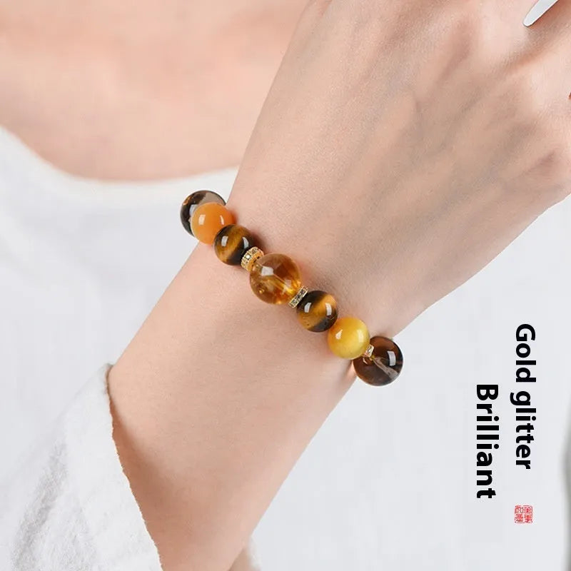 Women's natural style yellow tower crystal bead bracelet with 10mm Jinba large beads on wrist