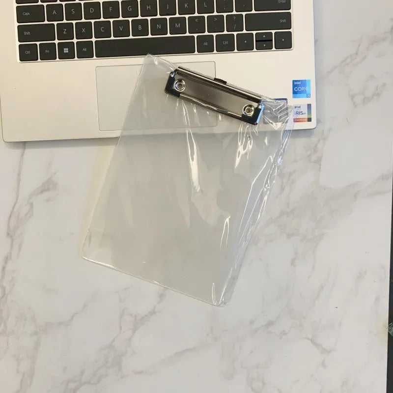 Transparent A4 plate holder with metal clip, shown in blue, acting as a writing board and document folder.