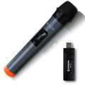 Black ZanSong V12 handheld dynamic microphone with USB receiver, audio cable, and adapter.