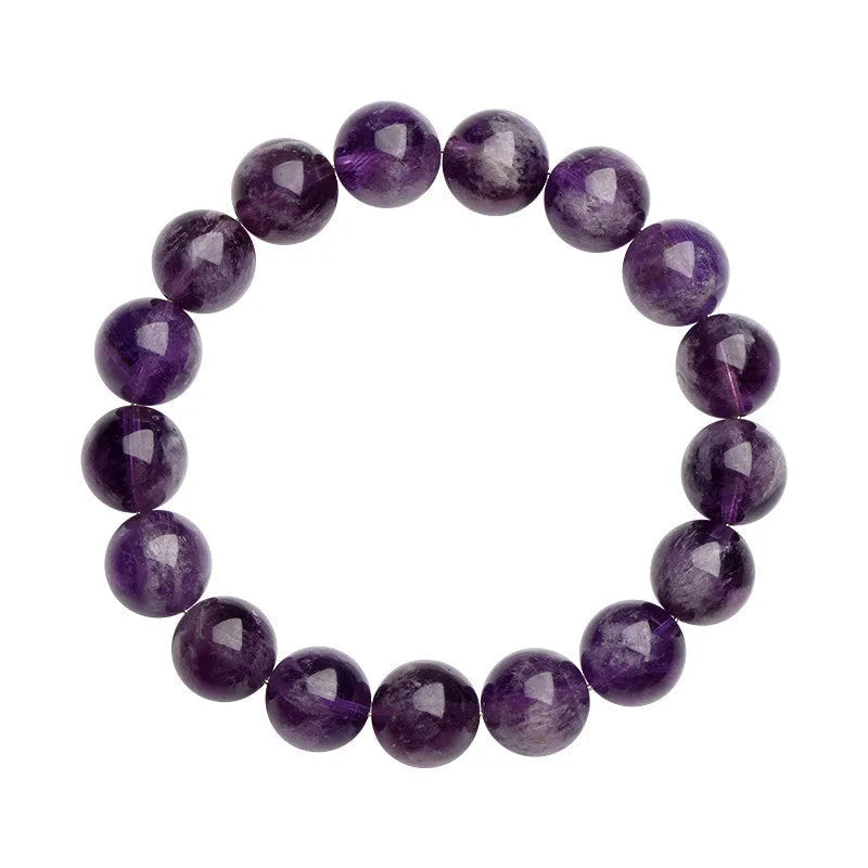 Natural feather amethyst crystal bracelet with scattered beads and Ruyi element on wrist.