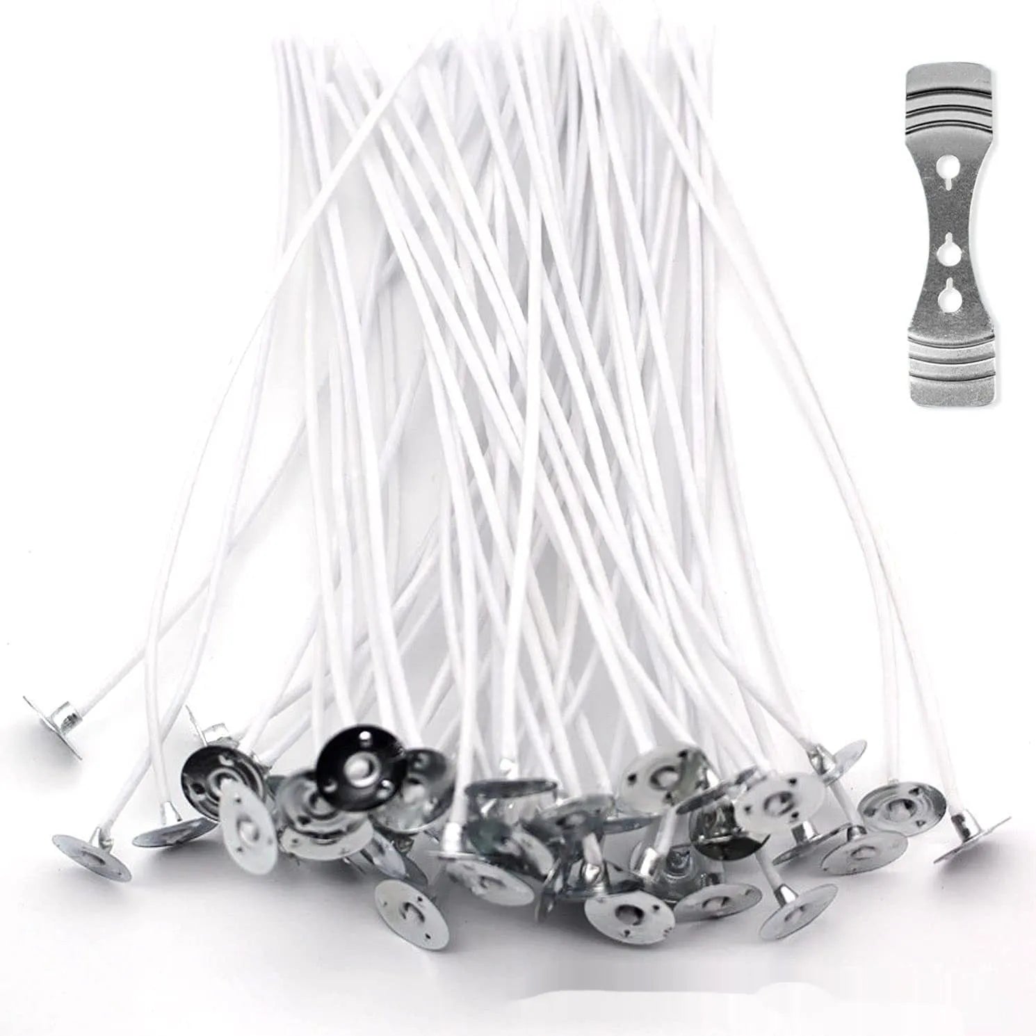 White cotton candle wicks in three lengths: 2.6cm, 6cm, and 8cm, laid out on a surface.