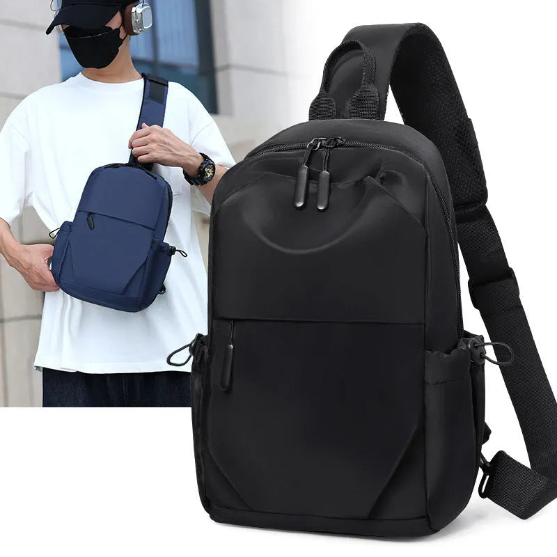 Men's grey lightweight waterproof chest bag with shoulder strap showing front compartment.