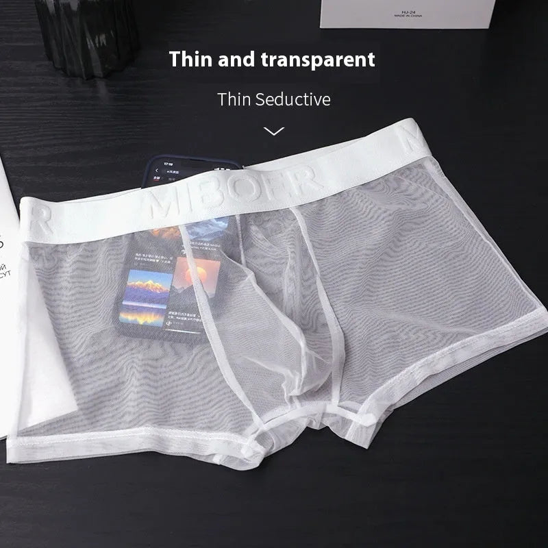 A pair of thin, solid-colour men's boxer shorts made from quick-dry polyester fabric.