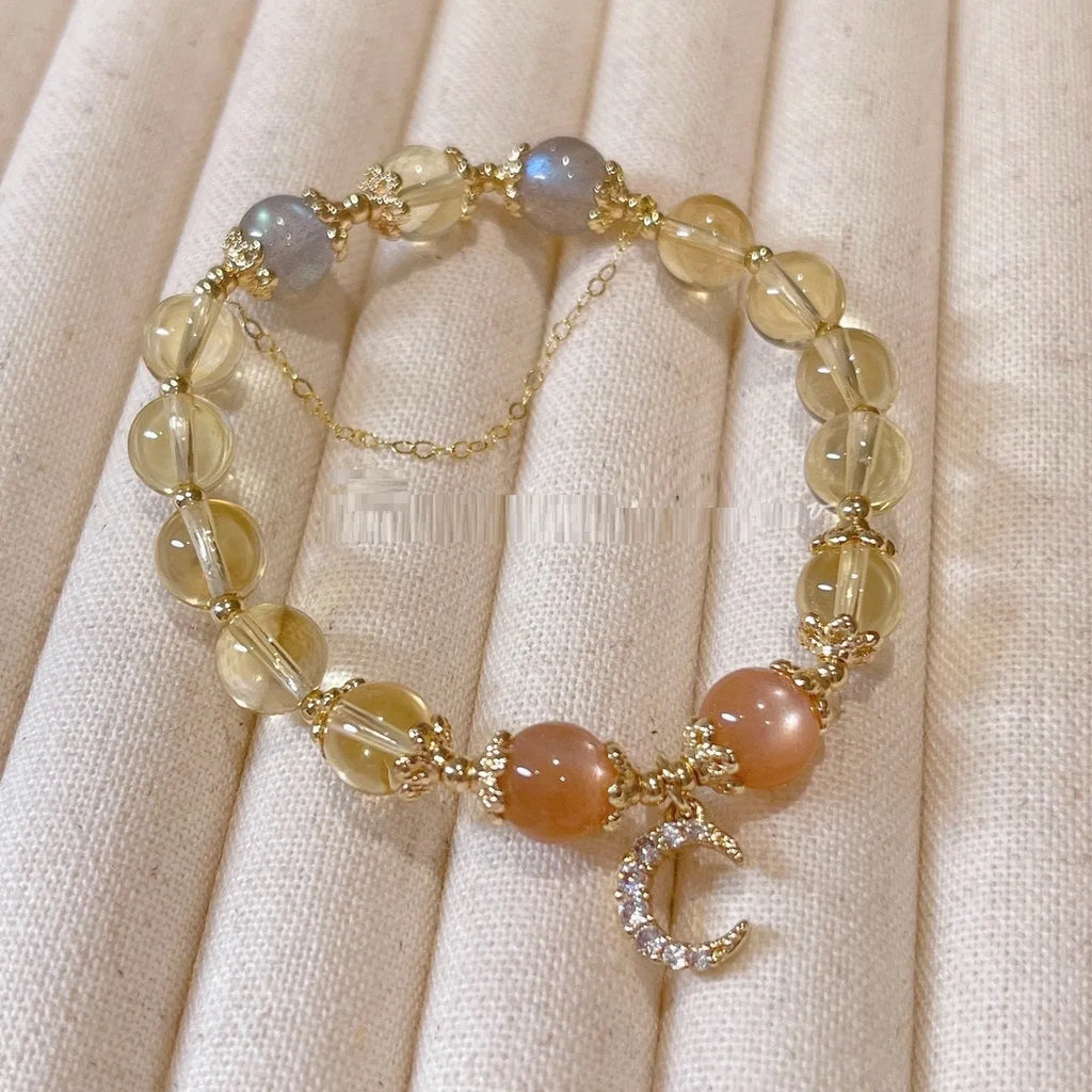 Chinese style women's crystal bracelet with 14K gilded moonstone, golden sun stone, and citrine colour diamond-shaped elements