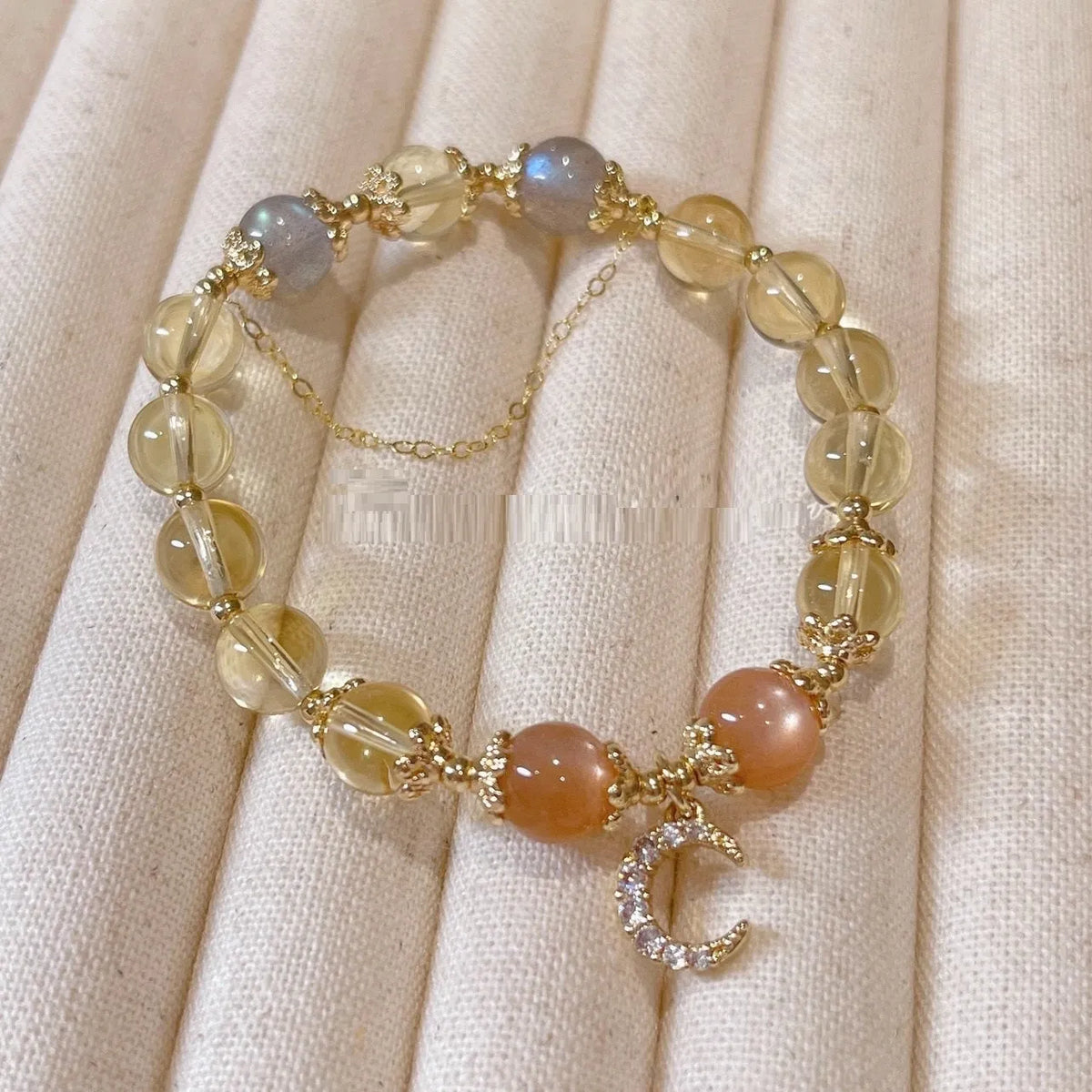 Chinese style women's crystal bracelet with 14K gilded moonstone, golden sun stone, and citrine colour diamond-shaped elements