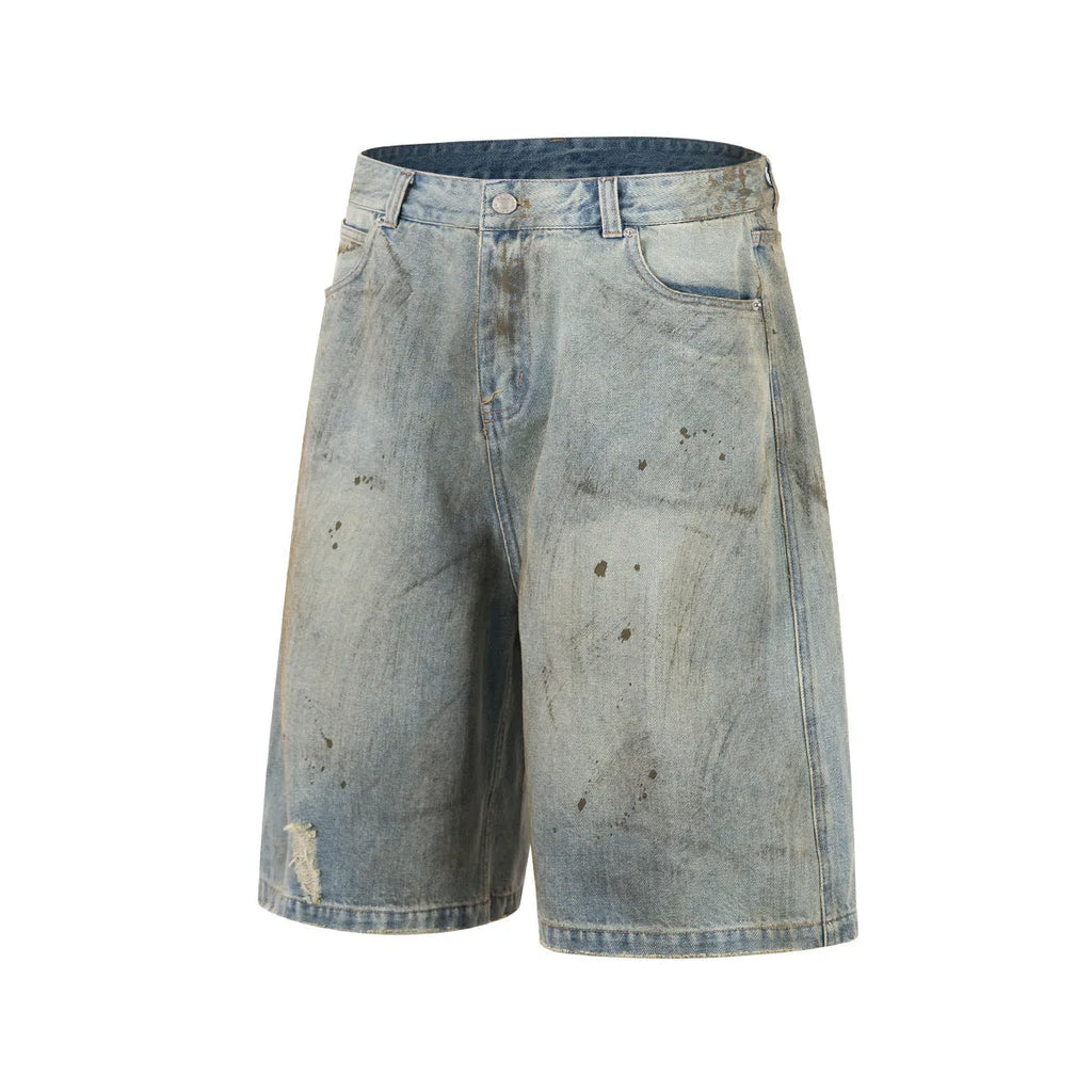 Blue washed cropped denim jeans with straight leg and zipper fly on mannequin