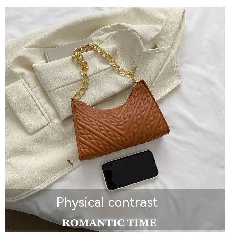 Brown PU pleated chain baguette shoulder bag showing vertical square shape with sewing line detailing