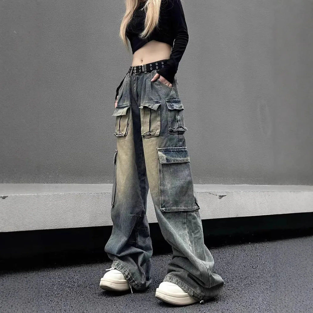 Light blue loose-fit denim jeans with multiple pockets and distressed finish