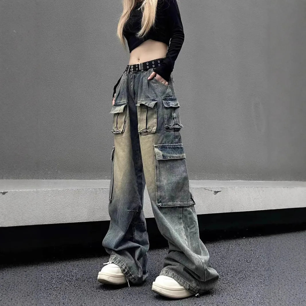 Light blue loose-fit denim jeans with multiple pockets and distressed finish
