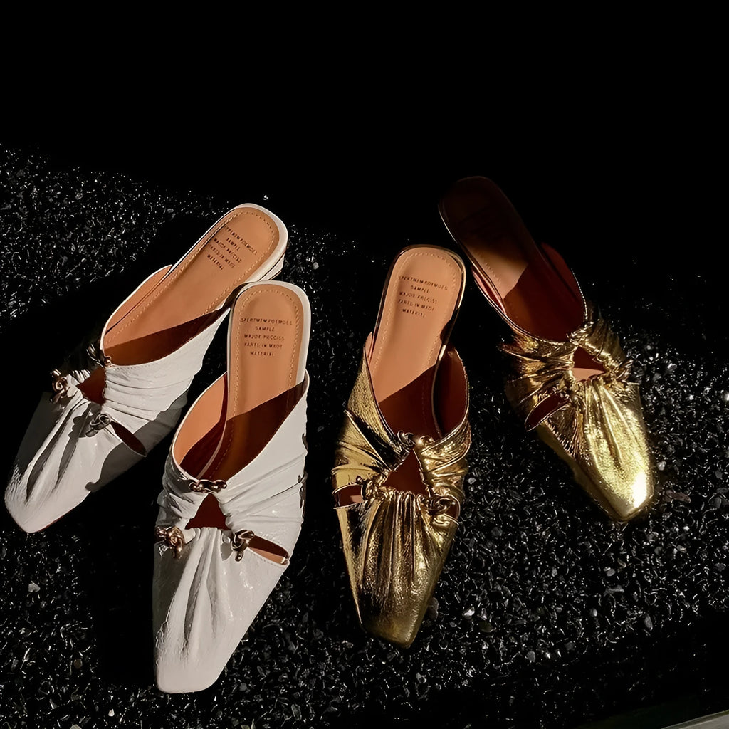 Women's genuine leather half toe cap slippers in gold colour with a low heel and square toe.