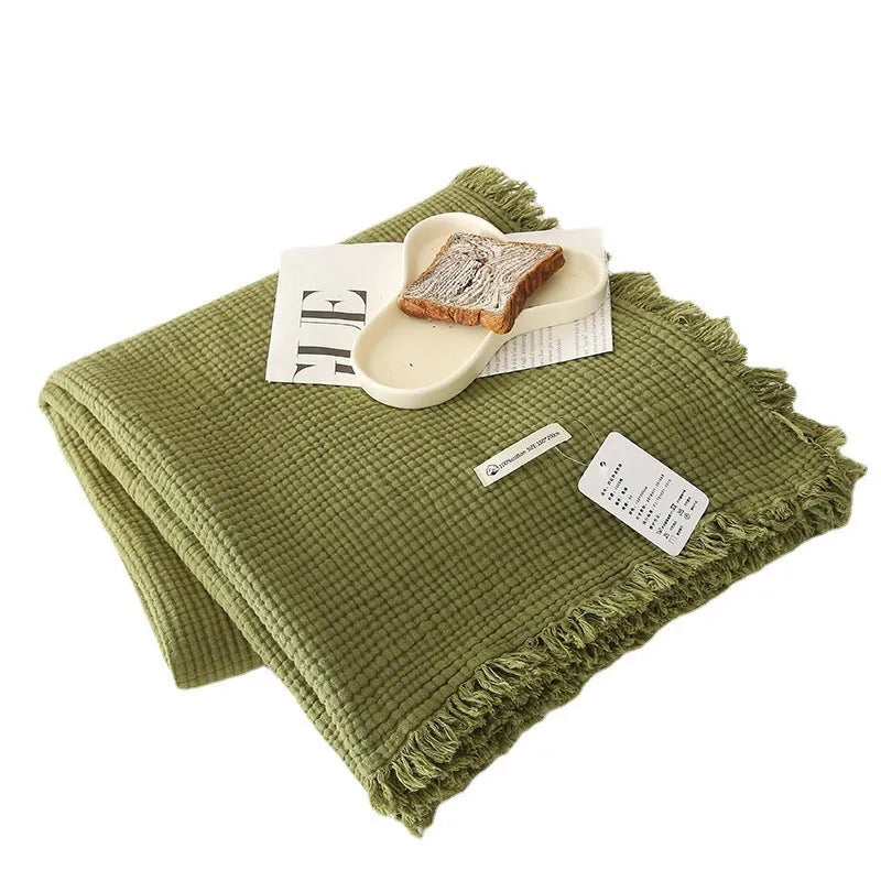 Four-layer gauze cotton blanket with tassel fringe in avocado green colour