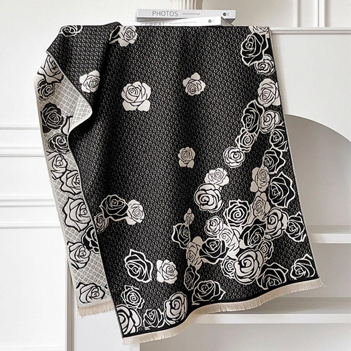 Long gray cashmere-like winter scarf with tassels laid flat showing its 185cm length