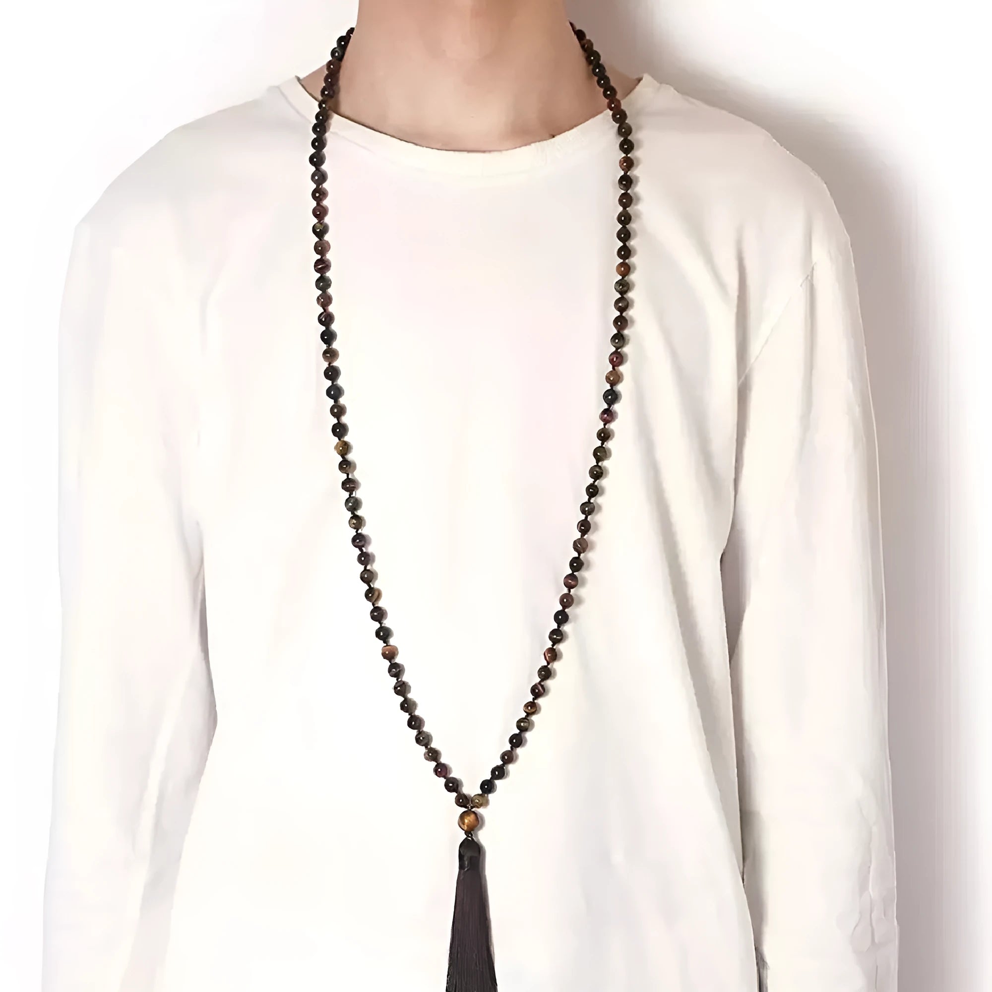 Long multi-stone agate and amethyst tassel necklace with blue pattern, geometric beads.