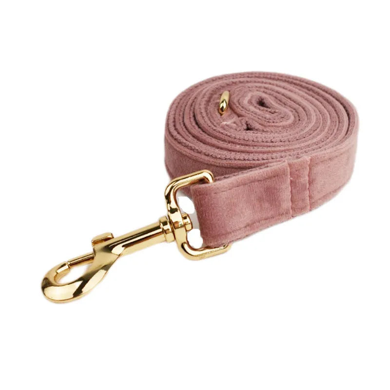 Light purple pink velvet dog collar with metal D-ring on a grey background