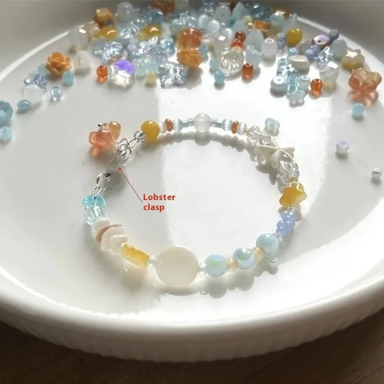 Orange sea coloured alloy bracelet with crystal beads and diamond pendant for women