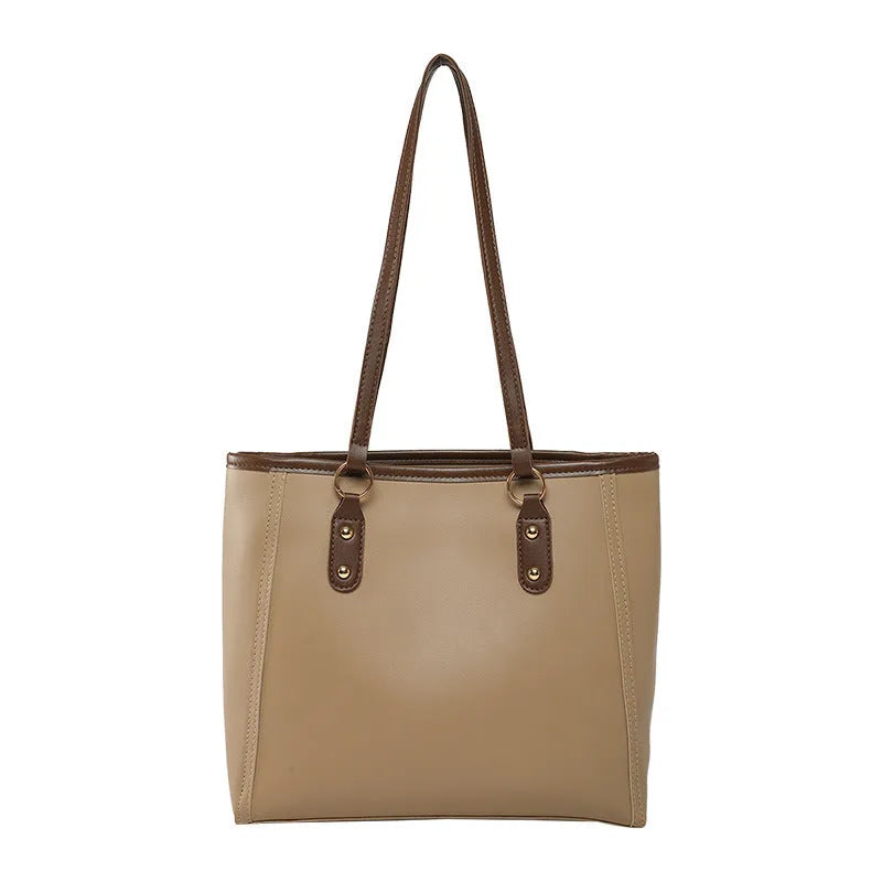 Contrast colour PU leather tote bag showing internal organisation compartments and external slit pocket