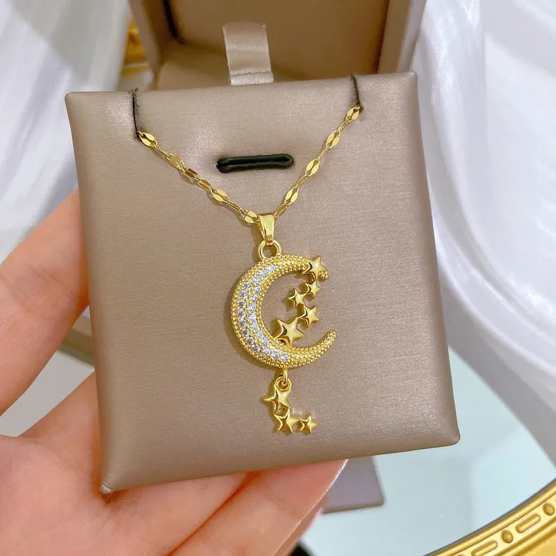 A218 moon pendant necklace with geometric diamond accents on stainless steel chain