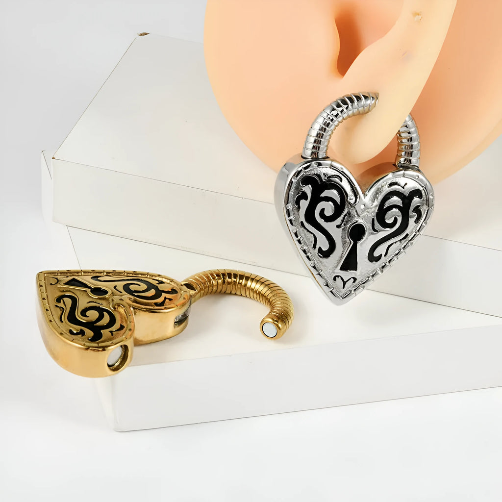 A single heart-shaped earring in stainless steel with a choice of gold or steel electroplated colour.