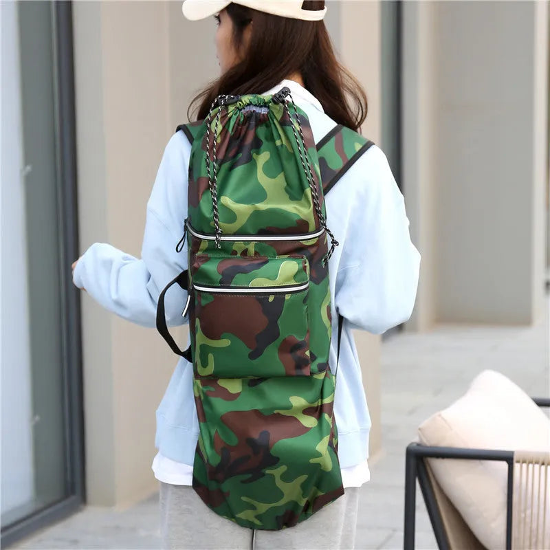 Waterproof nylon skate bag for yoga and outdoor sports gear in black, showing 20-35 litre capacity.