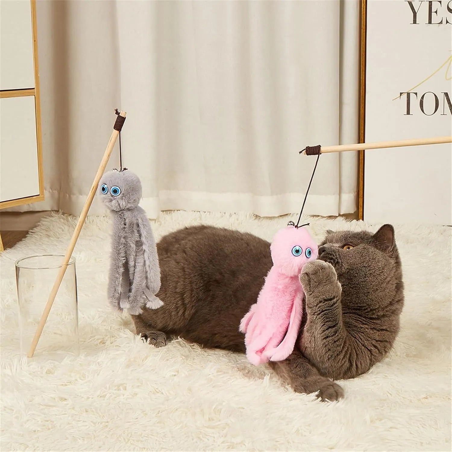 Brightly coloured cat octopus toy with long stick wand for interactive play with indoor cats