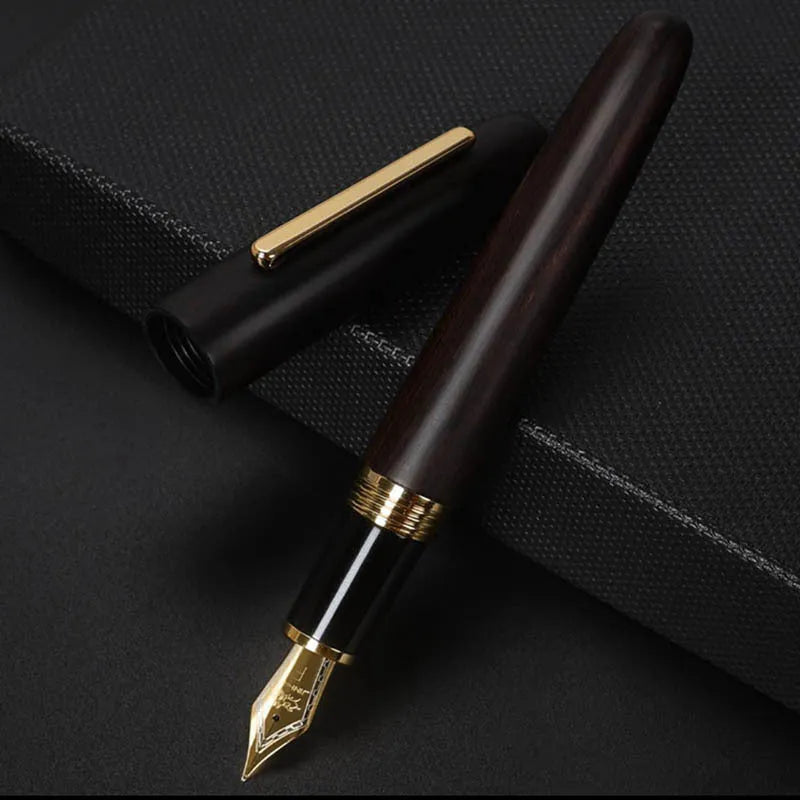 Wooden fountain pen with rotating cap showing seven wood colour options and four nib configurations