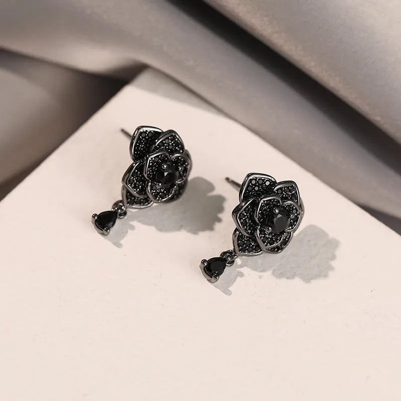 Black rose zircon floral stud earrings with electroplated copper construction and 18K purity finish