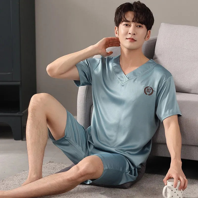 Men's ice silk pyjama set showing short-sleeved shirt and loose shorts in cooling fabric