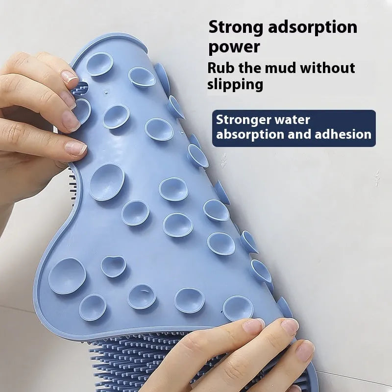 Blue silicone bath massage mat with raised nodes for back rubbing, measuring 31cm by 32cm