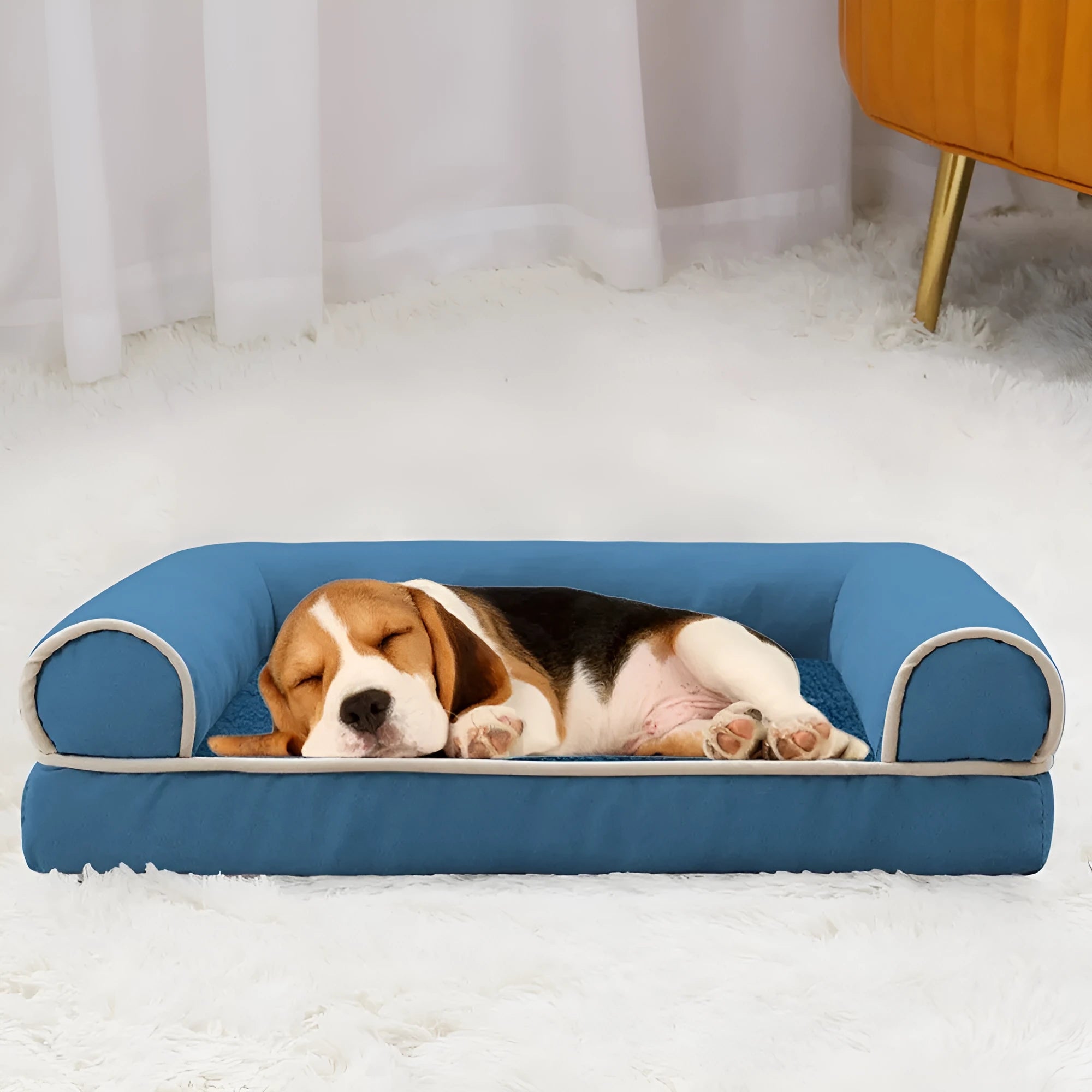 A square cloth-covered dog bed with sponge filling, shown in a blue colour.