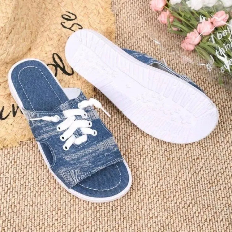 Blue Roman style women's canvas slippers with cloth upper and flat rubber sole