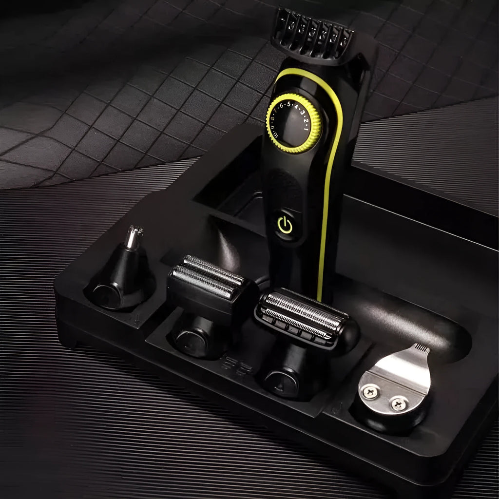 Black KM-696 rechargeable electric hair clipper kit with stainless steel blades on a stand