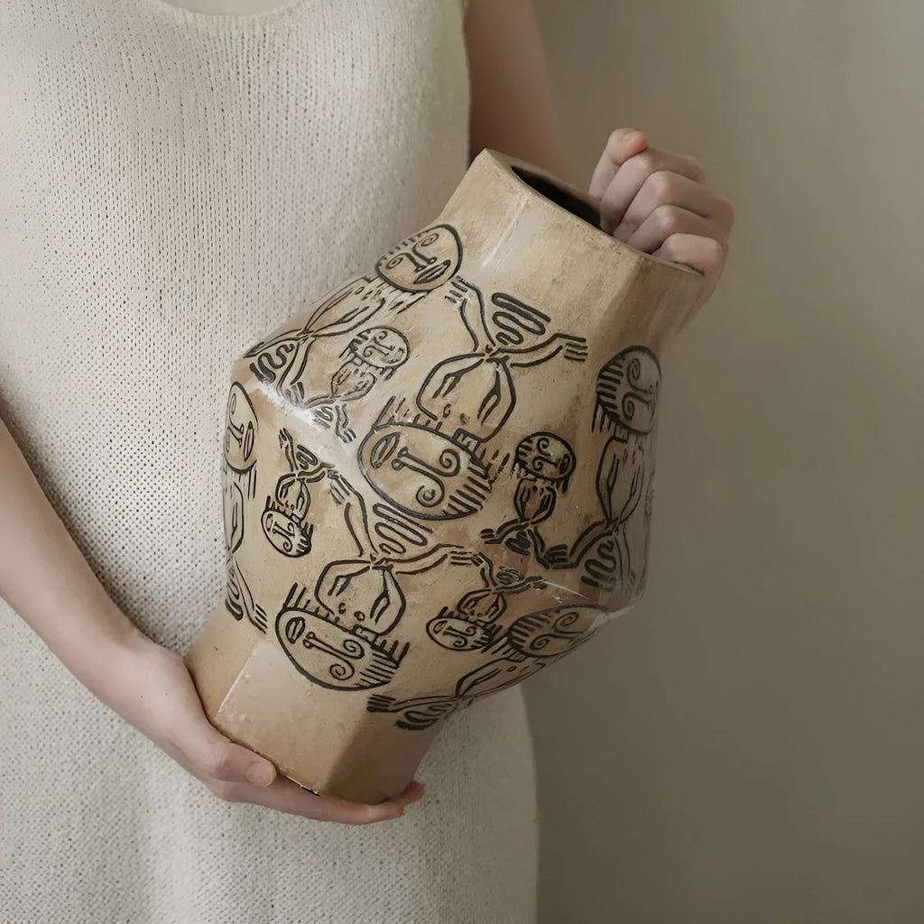 Hand-painted ceramic cylindrical table vase with carved religious and symbolic tribal totem flower patterns in large or small size