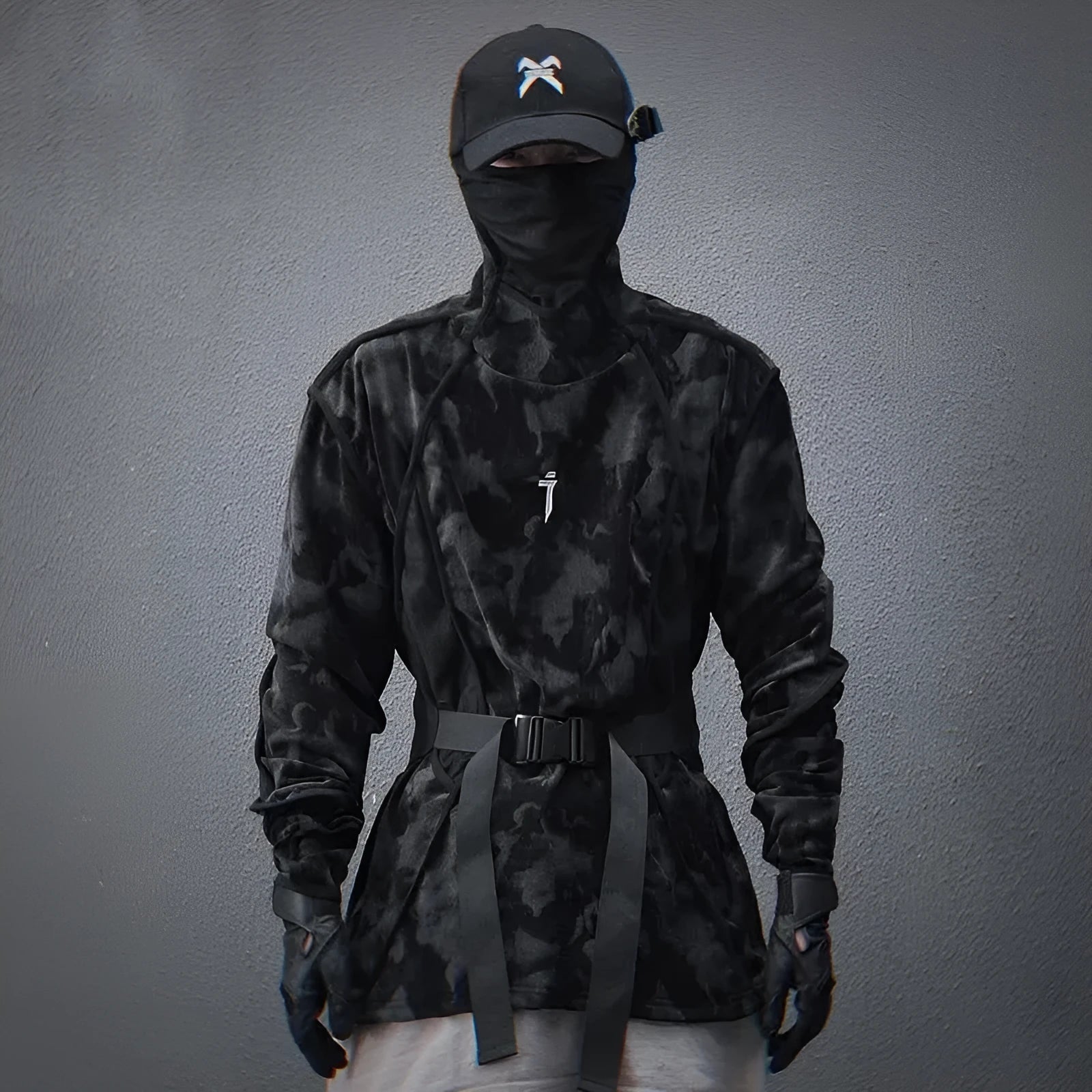 Men's black and grey tie dye pattern sweater with a finger turtleneck collar and drop shoulders.