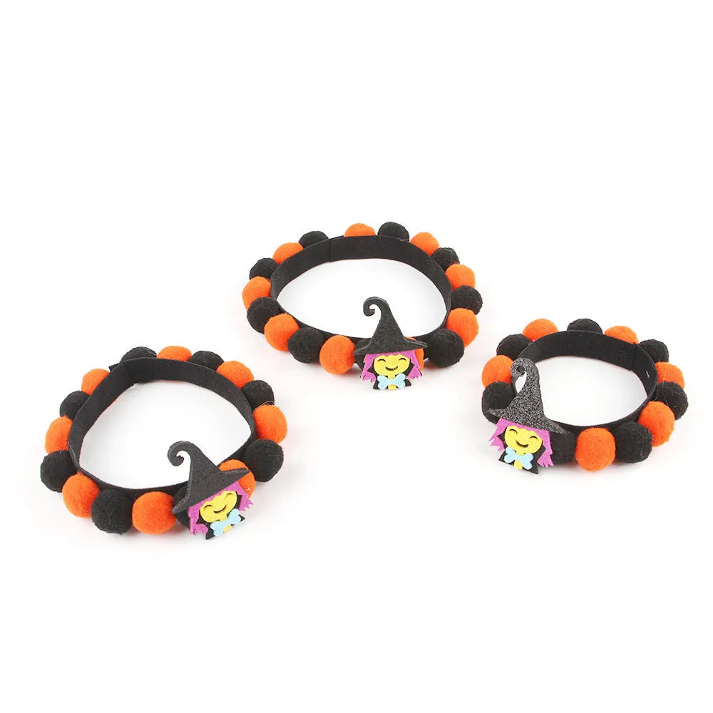 Halloween pet collar with fur ball pumpkin accessory in six festive designs for cats and dogs