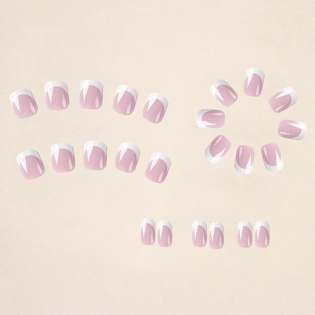 Twenty-four white plaid pattern fake nails with square tips arranged on a surface.