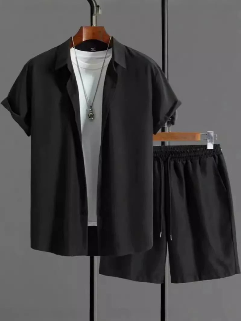 Mens black and white jacquard short sleeve shirt and matching shorts suit set on a hanger.