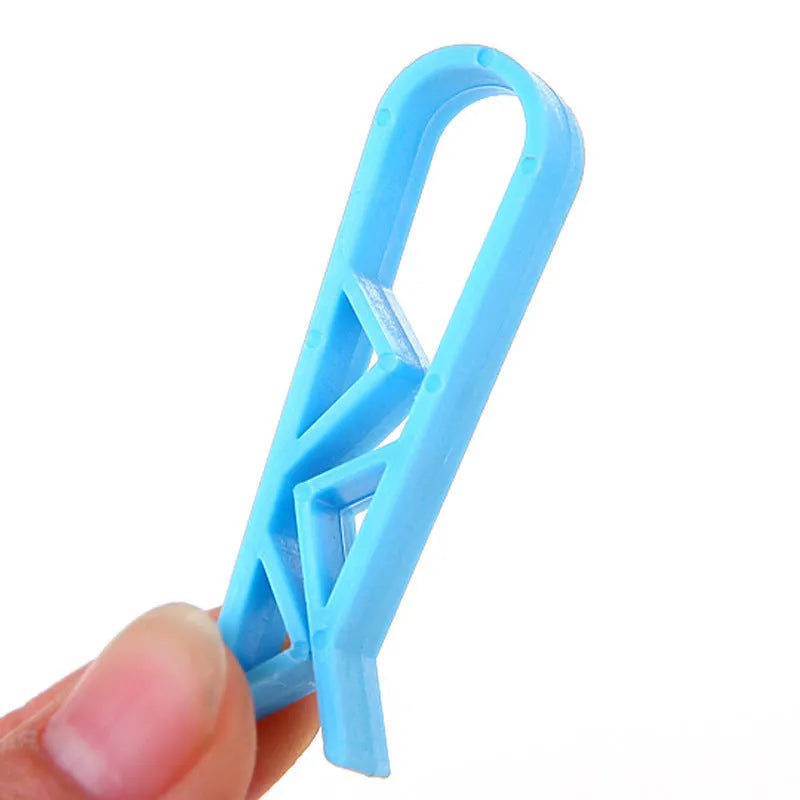 Black PP plastic garbage bag fixing clips securing a bag to a bin rim