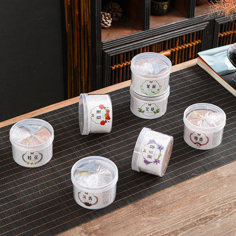 40 small half-handmade incense coils in a chosen fragrance such as sandalwood or agarwood for household use