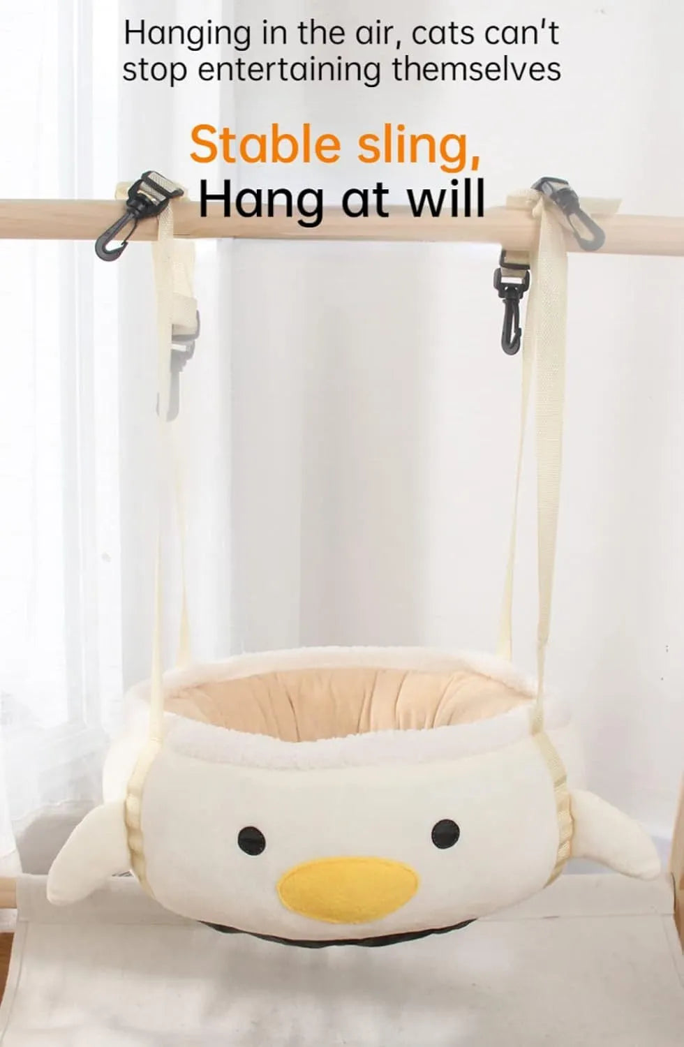 Green chick-shaped cat bed shown both hanging as a hammock and lying flat on the floor.