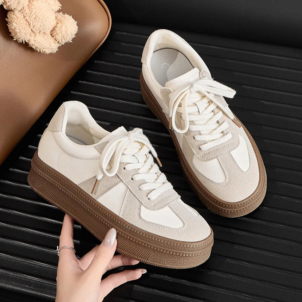 Milky white round toe board shoes with cross shoulder straps and front lace-up fastening