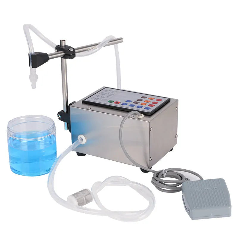 CNC automatic quantitative filling machine GFK-280 model on a worktop with power adapters
