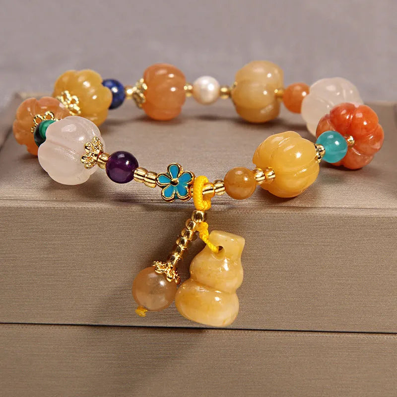 Yellow agate crystal and gold silk women's bracelet in khaki colour.