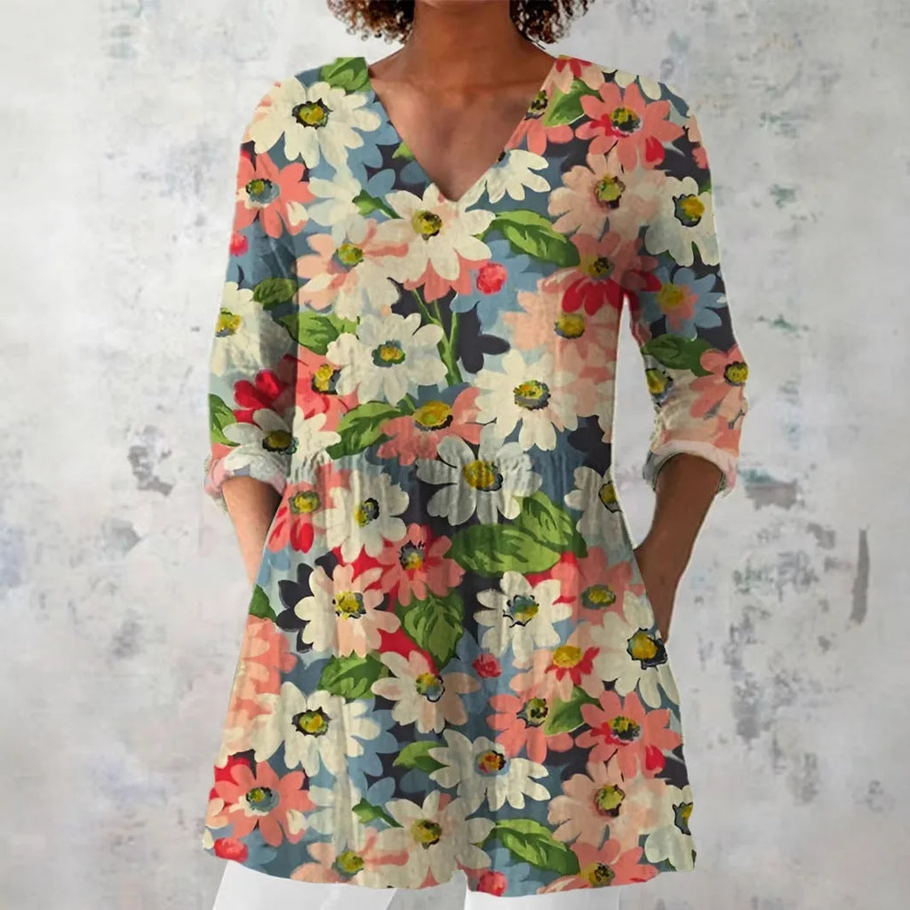 Women's retro style slim fit long-sleeved top with a printed design, shown on a hanger.