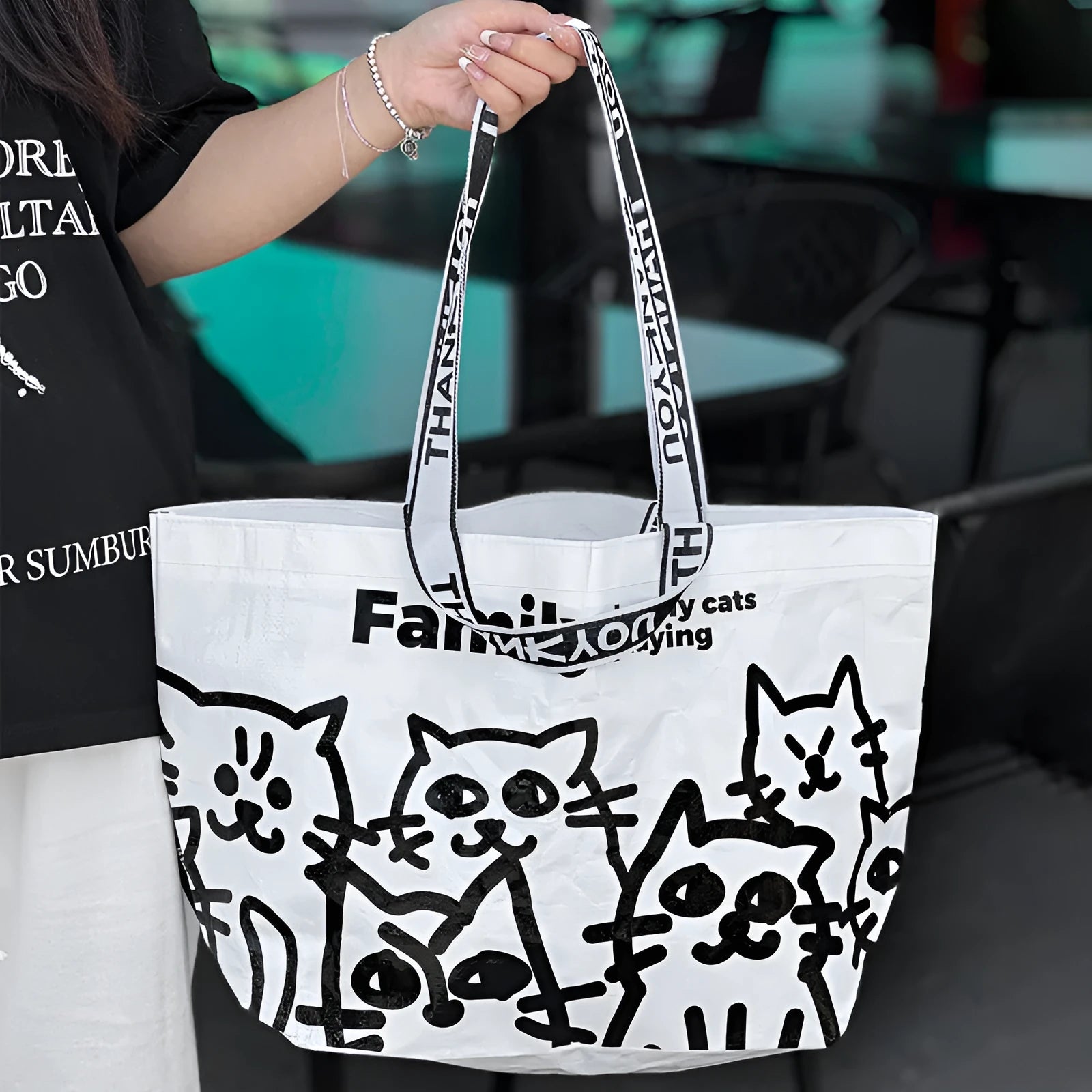 Green waterproof woven handbag with colour printing, portable design for clothing and cosmetics
