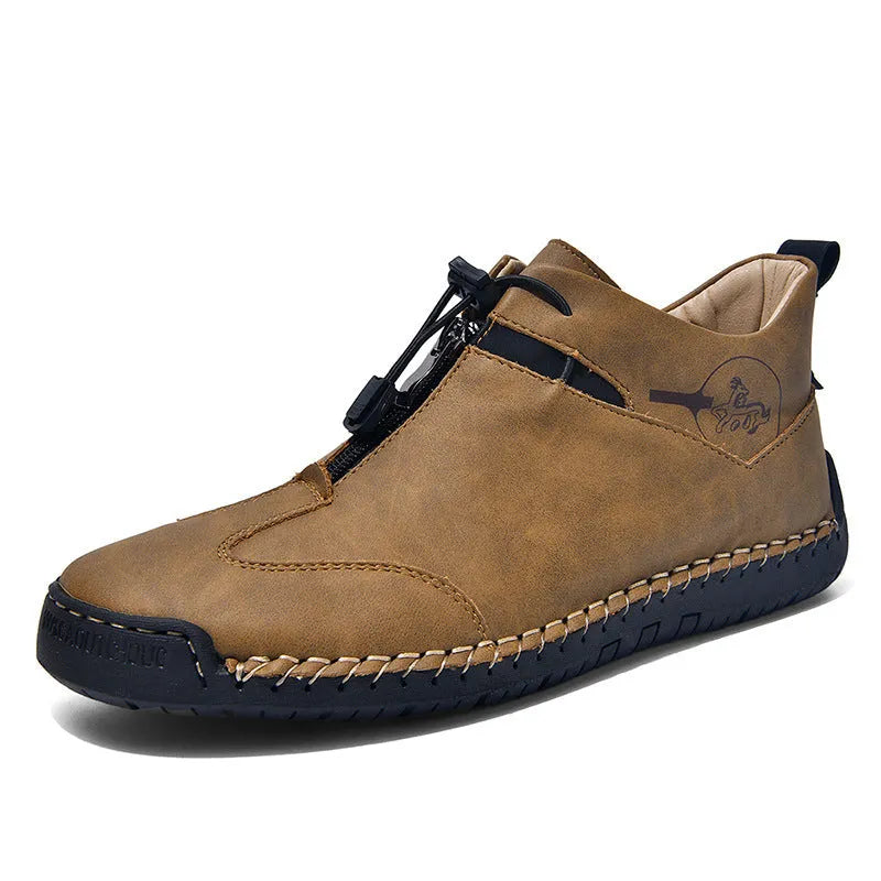 Men's black casual leather shoe with mid heel, rounded toe, and sewing thread detail on a white background.