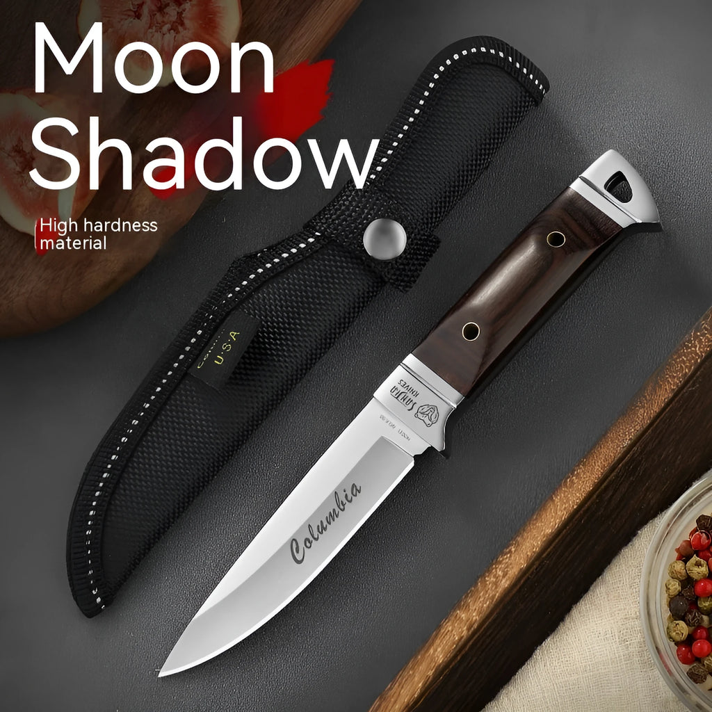 Stainless steel camping fruit knife with national style design in its leather case.