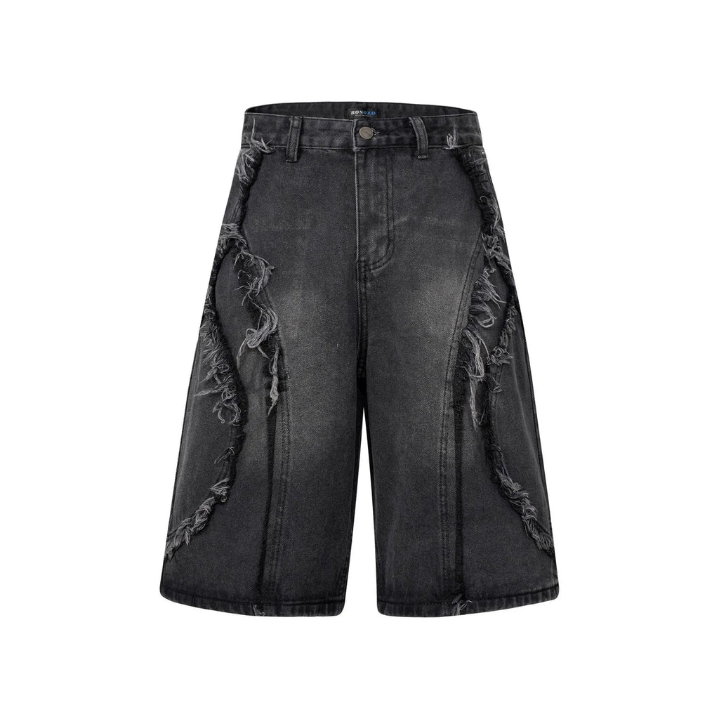 Distressed raw edge denim shorts in straight cut with cropped length for hip hop streetwear style